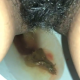 From under the toilet, a very cute girl takes a longer shit with hanging logs and a look at the product in the bowl. Filmed from a between the legs perspective. Vertical format video. About 2.5 minutes.